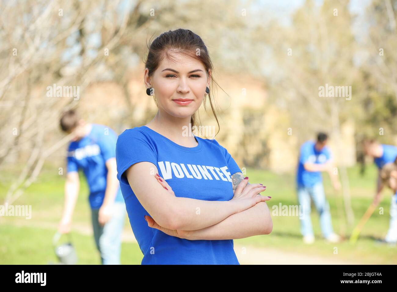 Beautiful young volunteer team hi-res stock photography and images - Alamy