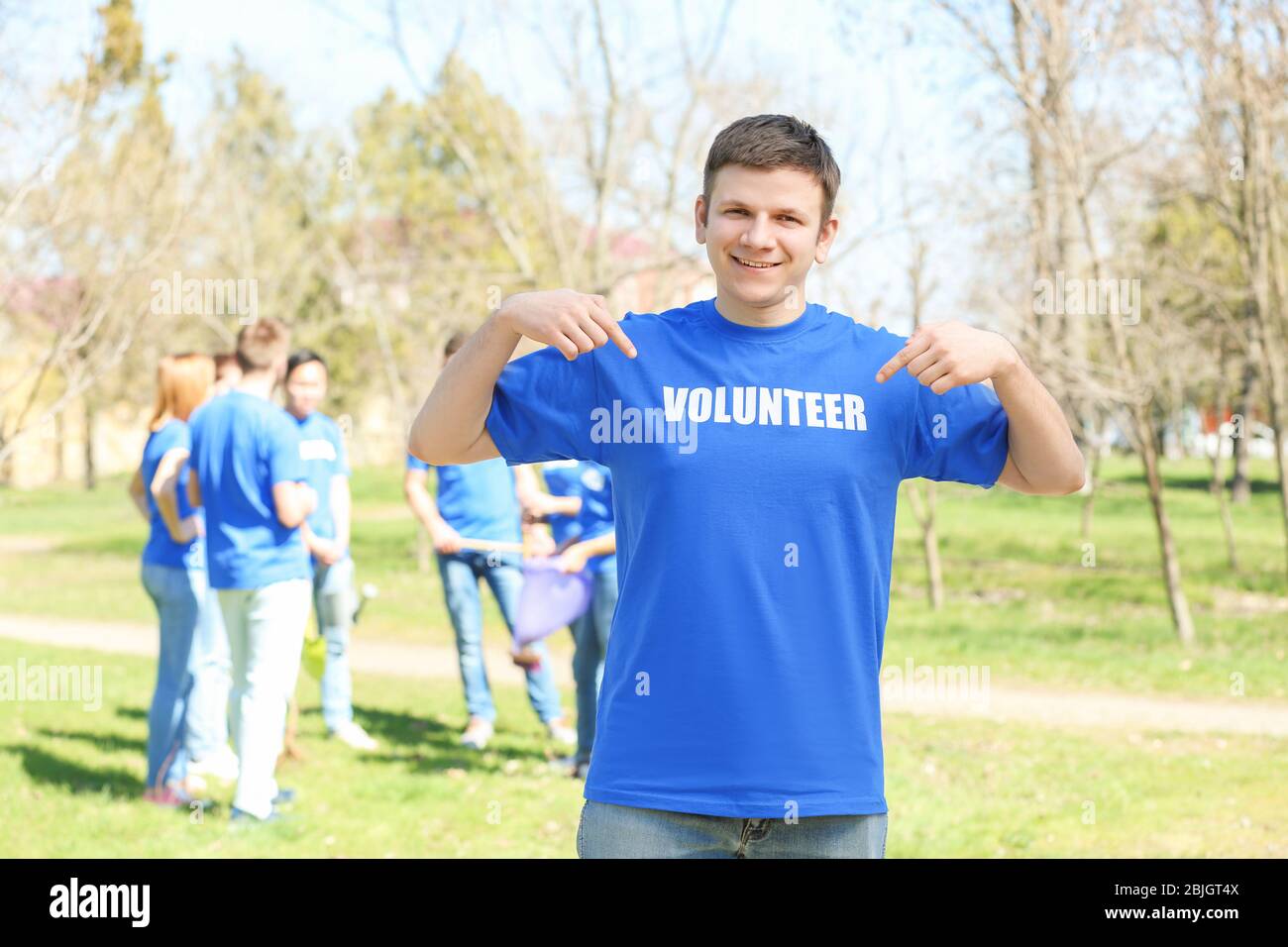Female volunteers young trees hi-res stock photography and images - Alamy