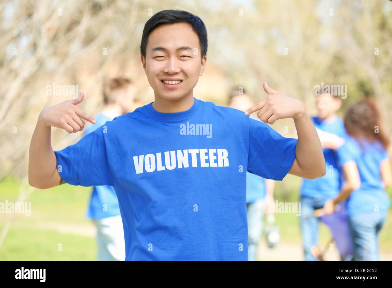 Young asian female volunteer hi-res stock photography and images - Alamy