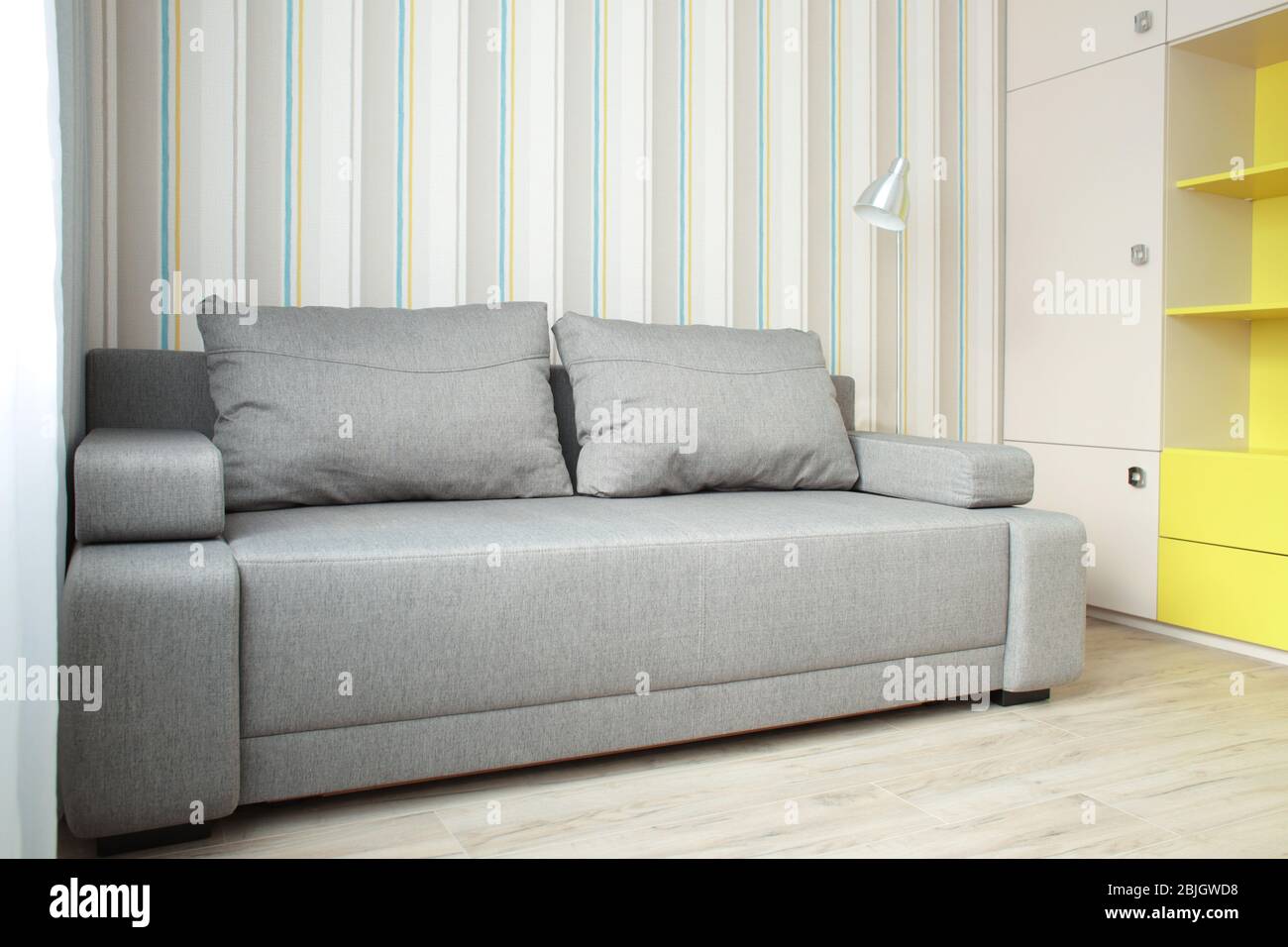 Sofa in modern living room interior Stock Photo - Alamy