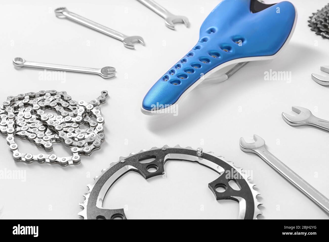 Bicycle parts and repair tools on white background Stock Photo Alamy