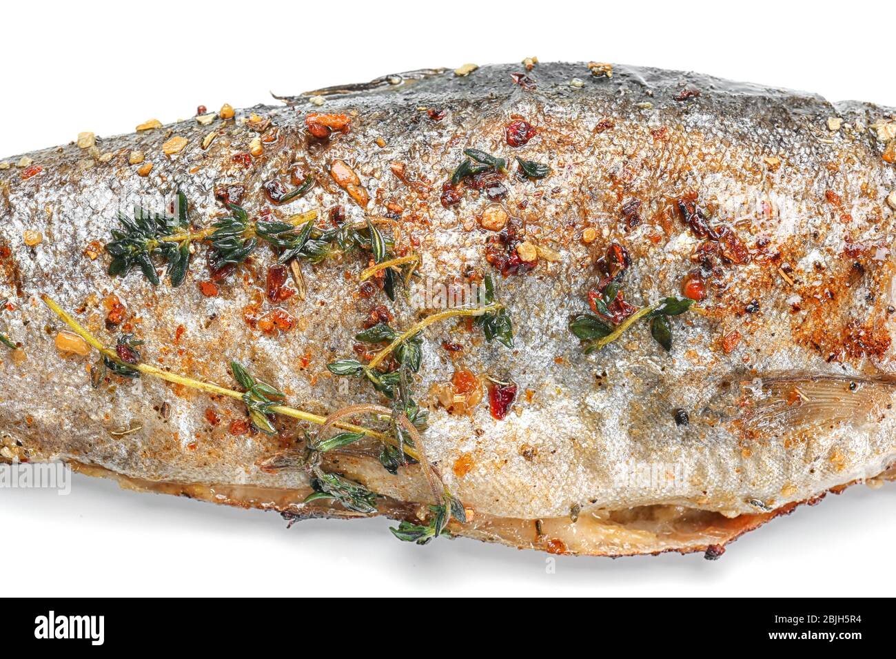 Delicious freshly fried fish on white background Stock Photo