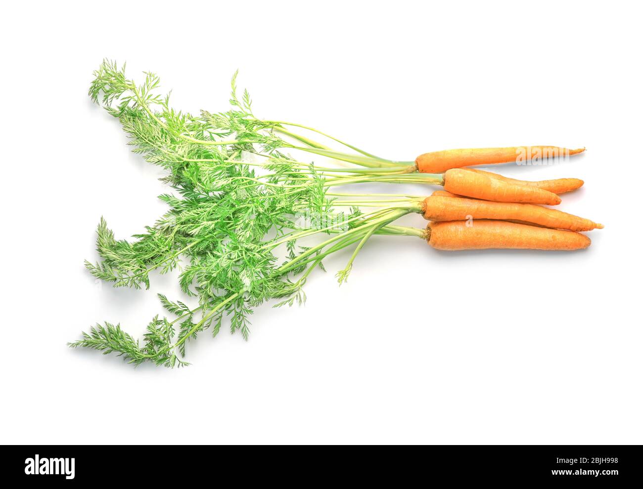 Fresh carrot with leaves isolated on white Stock Photo Alamy