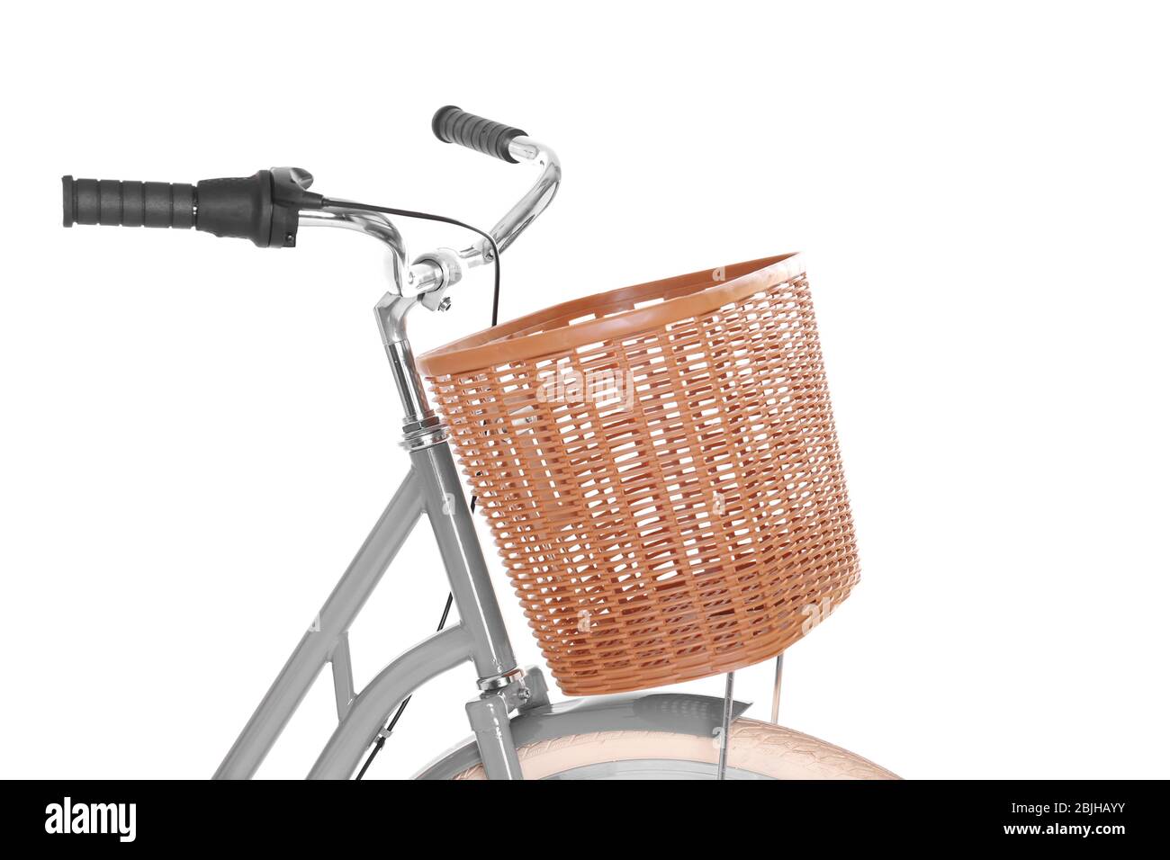 Bicycle with wicker basket on white background Stock Photo