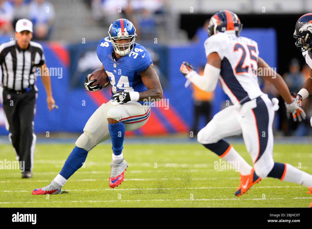 September 15, 2013: New York Giants running back Brandon Jacobs (34) carries the ball during the first half of a week 2 NFL matchup between the Denver Stock Photo