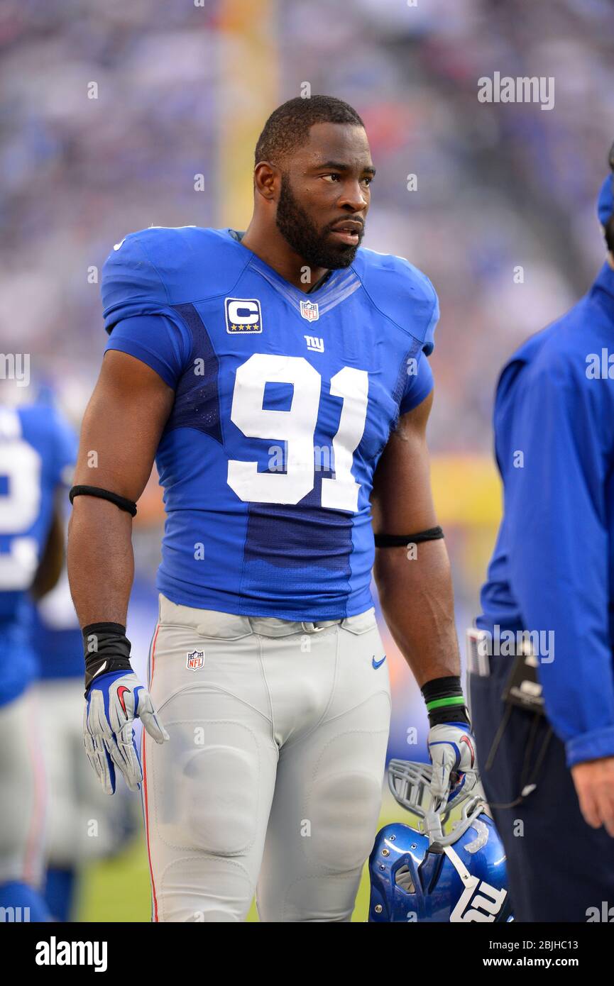 New York Giants defensive end Justin Tuck (91) during player introductions  before NFL action between the New York Giants and the Carolina Panthers at  New Meadowlands Stadium in East Rutherford, New Jersey.