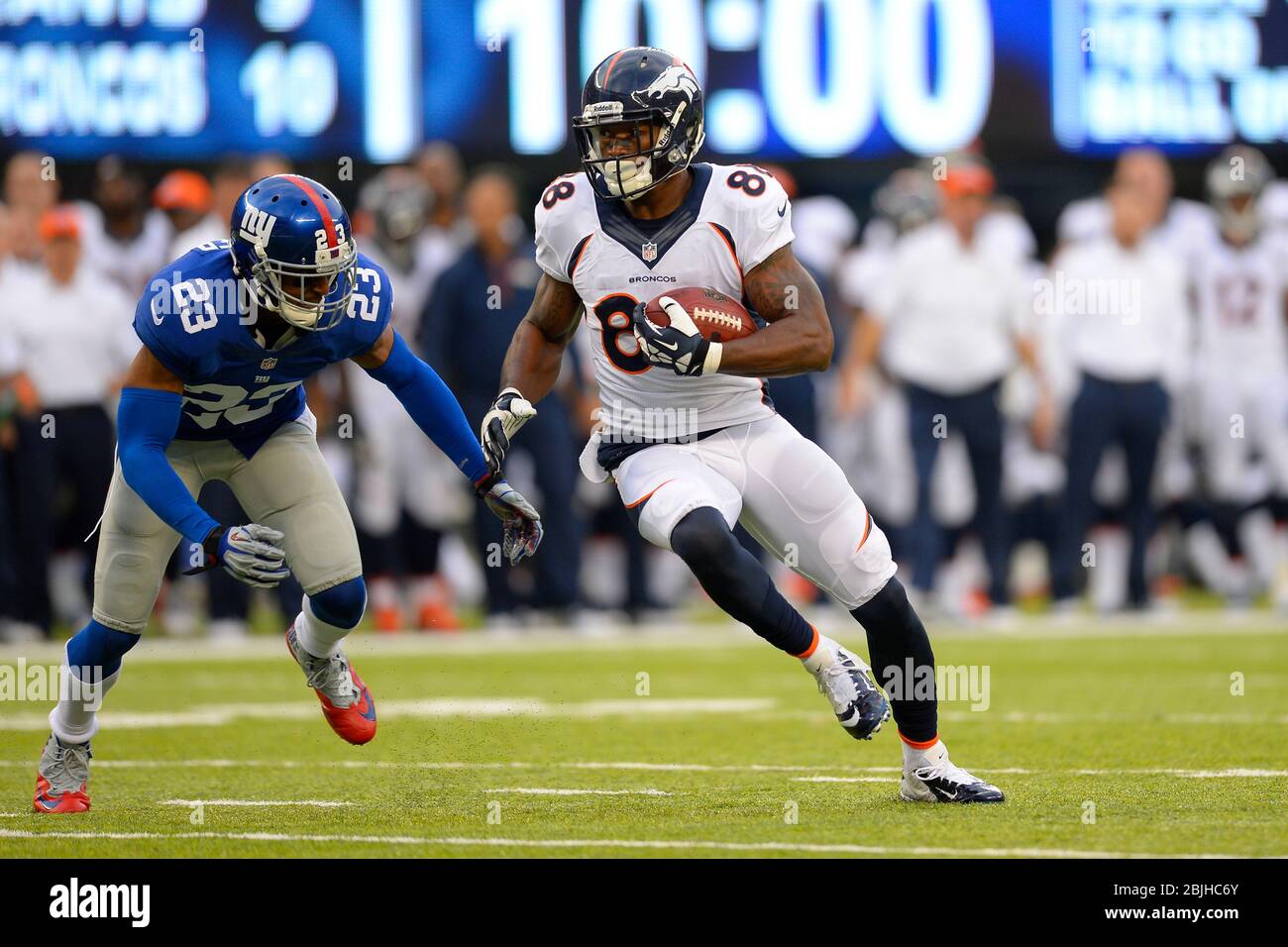 September 15, 2013: Denver Broncos wide receiver Demaryius Thomas (88) carries the ball from New York Giants cornerback Corey Webster (23) during the Stock Photo