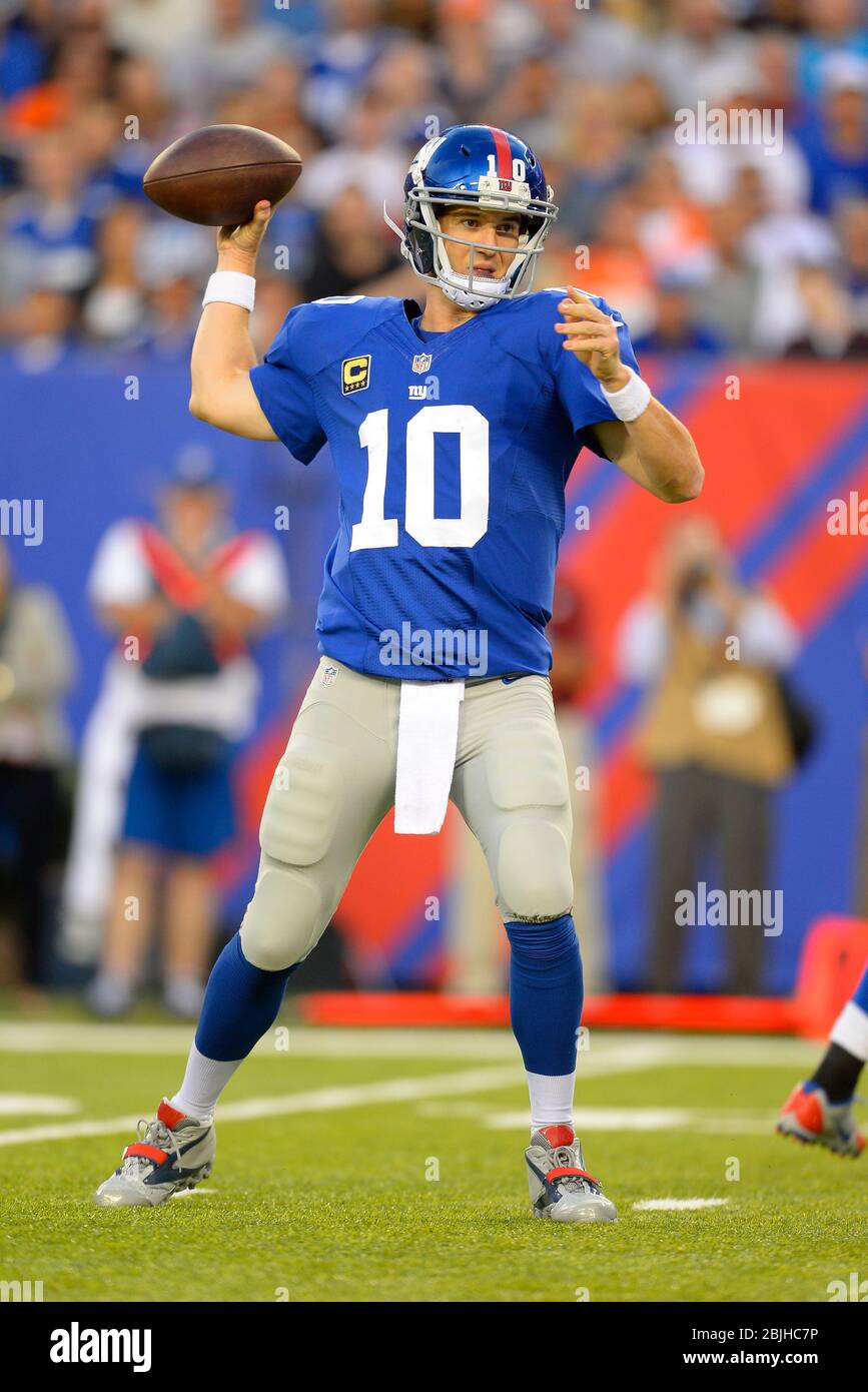 September 15, 2013: New York Giants quarterback Eli Manning (10) throws a pass during the second half of a week 2 NFL matchup between the Denver Bronc Stock Photo