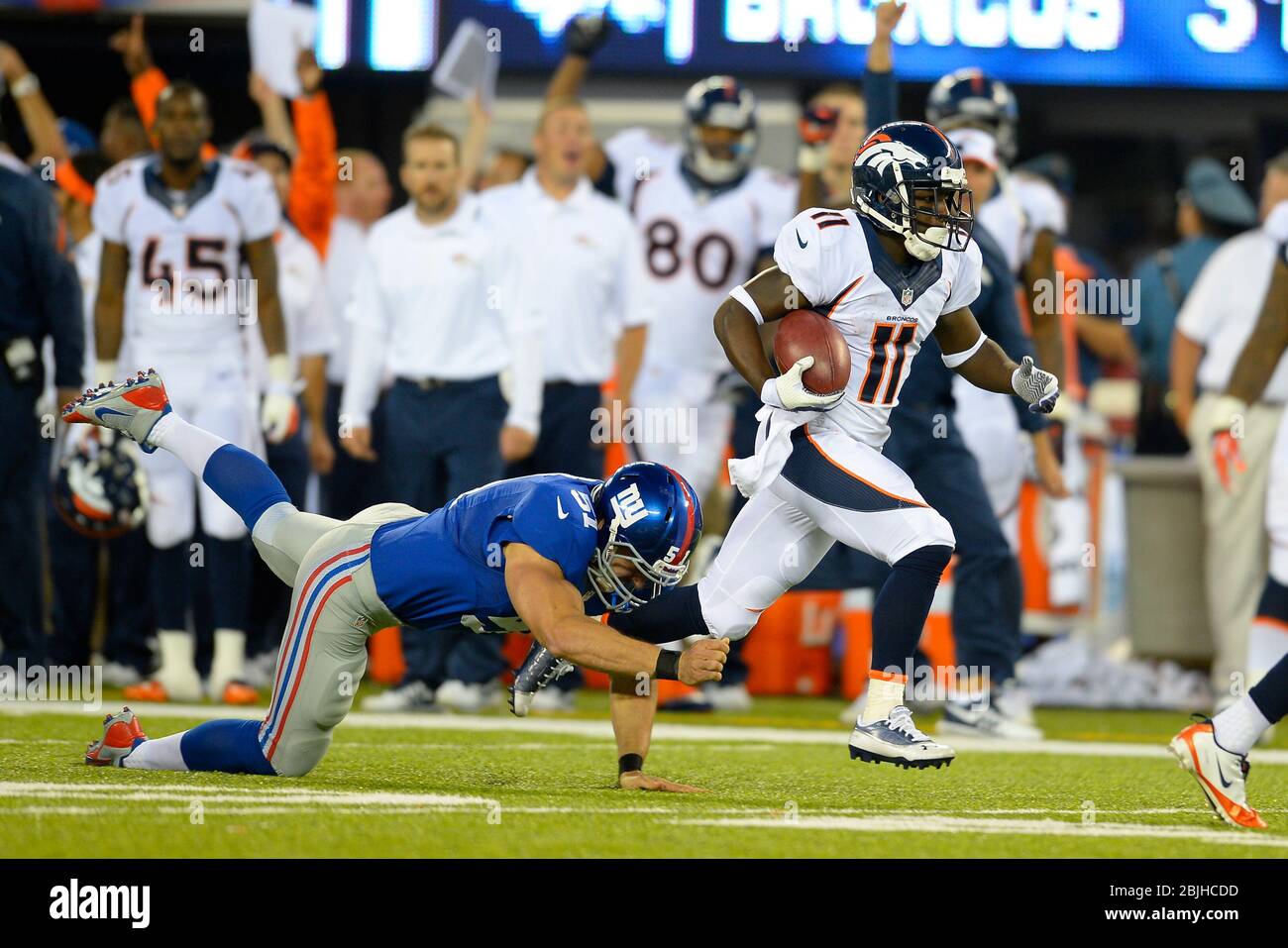 September 15, 2013: Denver Broncos wide receiver Trindon Holliday (11) runs back a 81 yard punt return during the second half of a week 2 NFL matchup Stock Photo