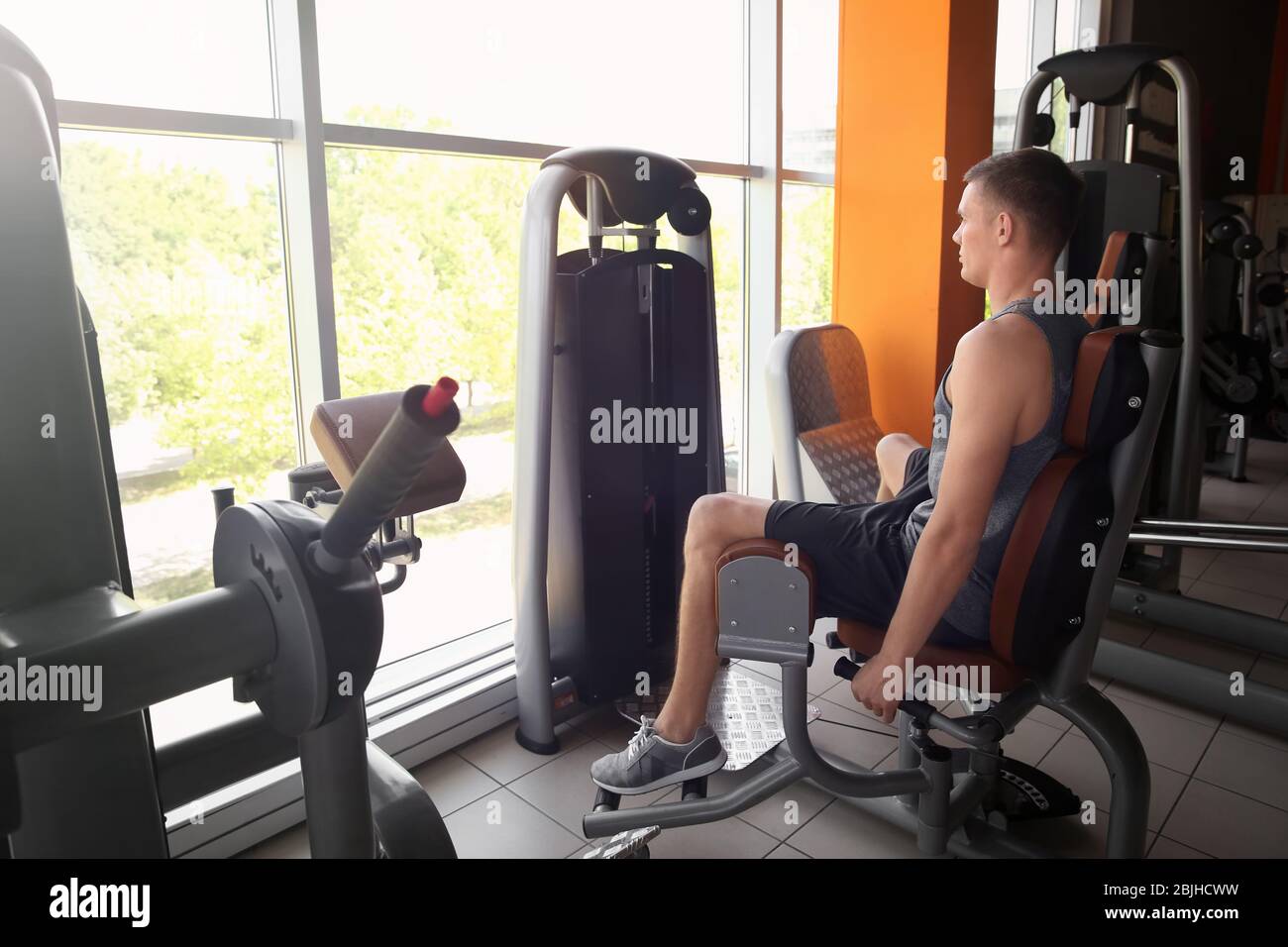 Man exercise spreading legs hi-res stock photography and images - Alamy