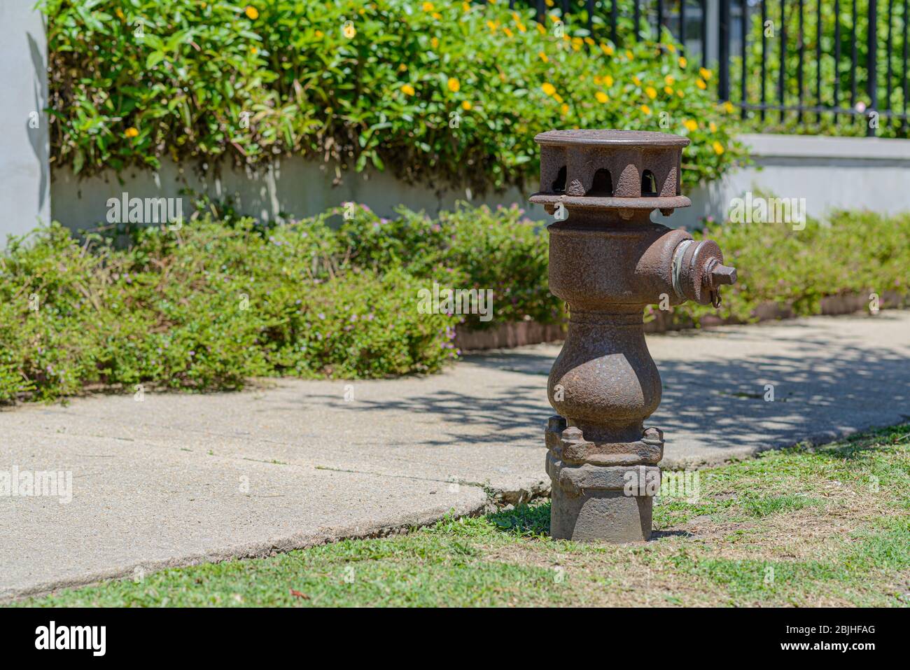 Oldest Fire Hydrant in New Orleans, installed 9/14/1869, across from Bayou St. John at the corner of Grand Route St. John and Moss Street Stock Photo