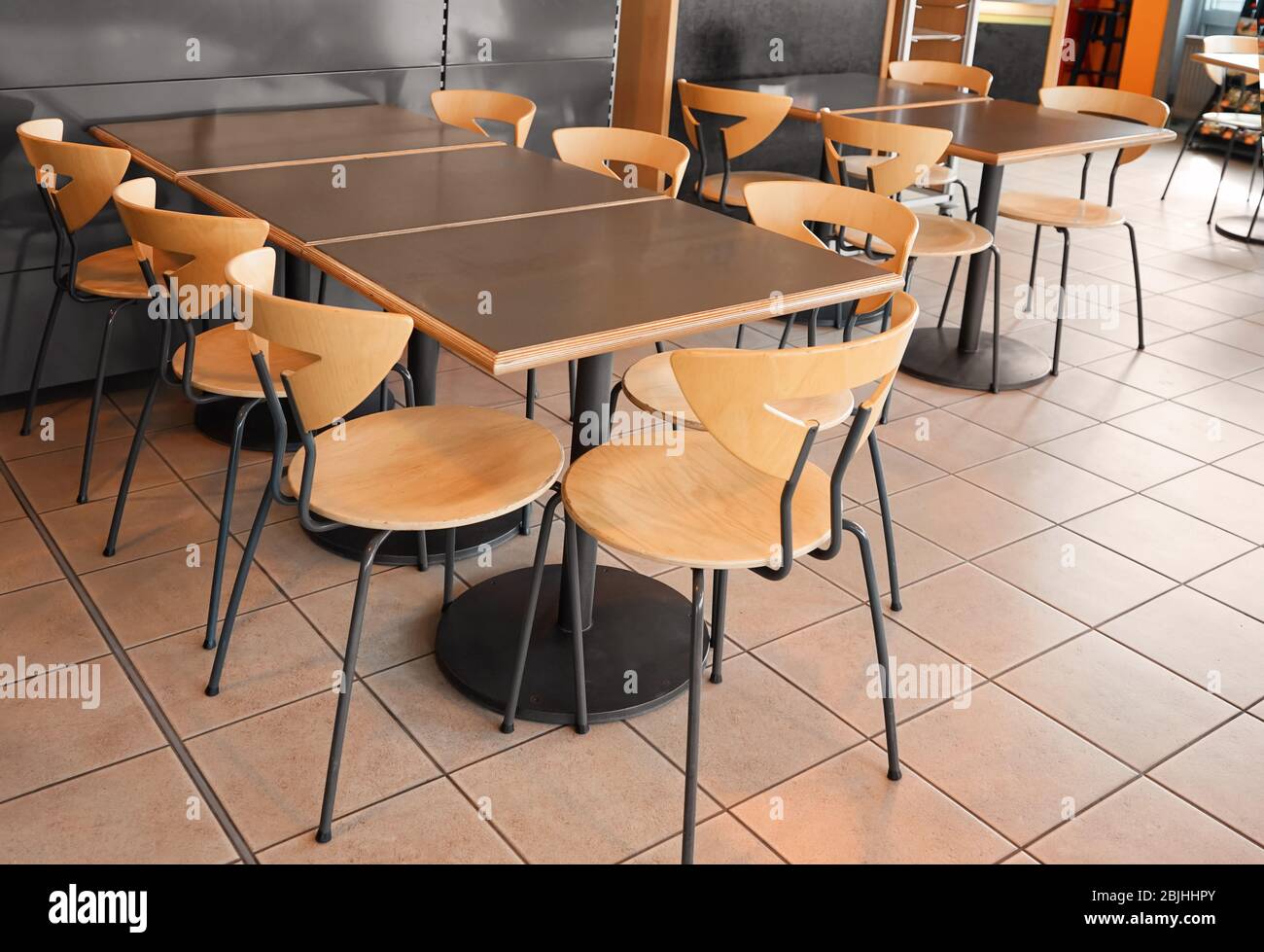 Modern cafeteria with tables and chairs Stock Photo Alamy
