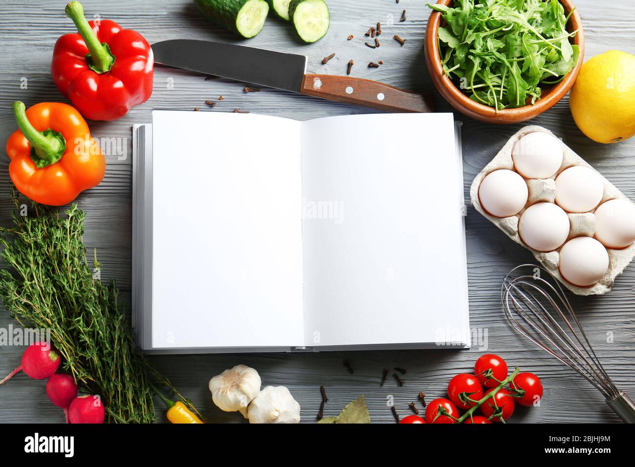 Open Notebook And Vegetables On Kitchen Table Cooking Classes Concept Stock Photo Alamy