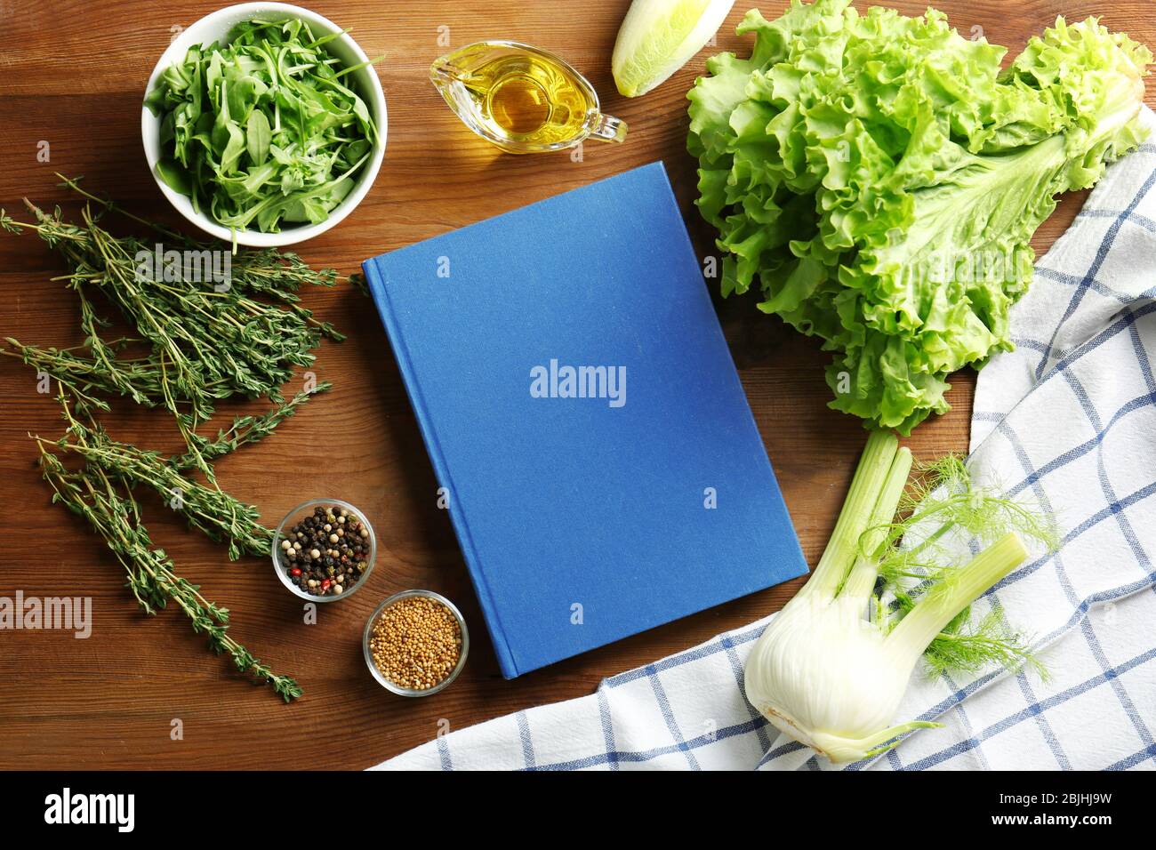 Notebook And Vegetables On Kitchen Table Cooking Classes Concept Stock Photo Alamy