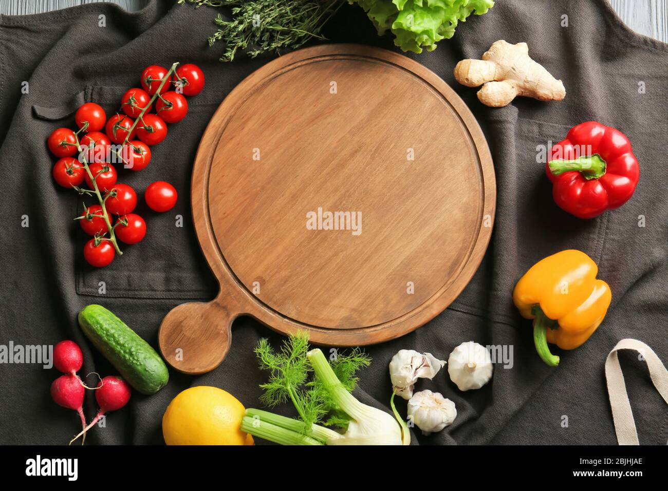 Wooden Board And Vegetables On Kitchen Table Cooking Classes Concept Stock Photo Alamy
