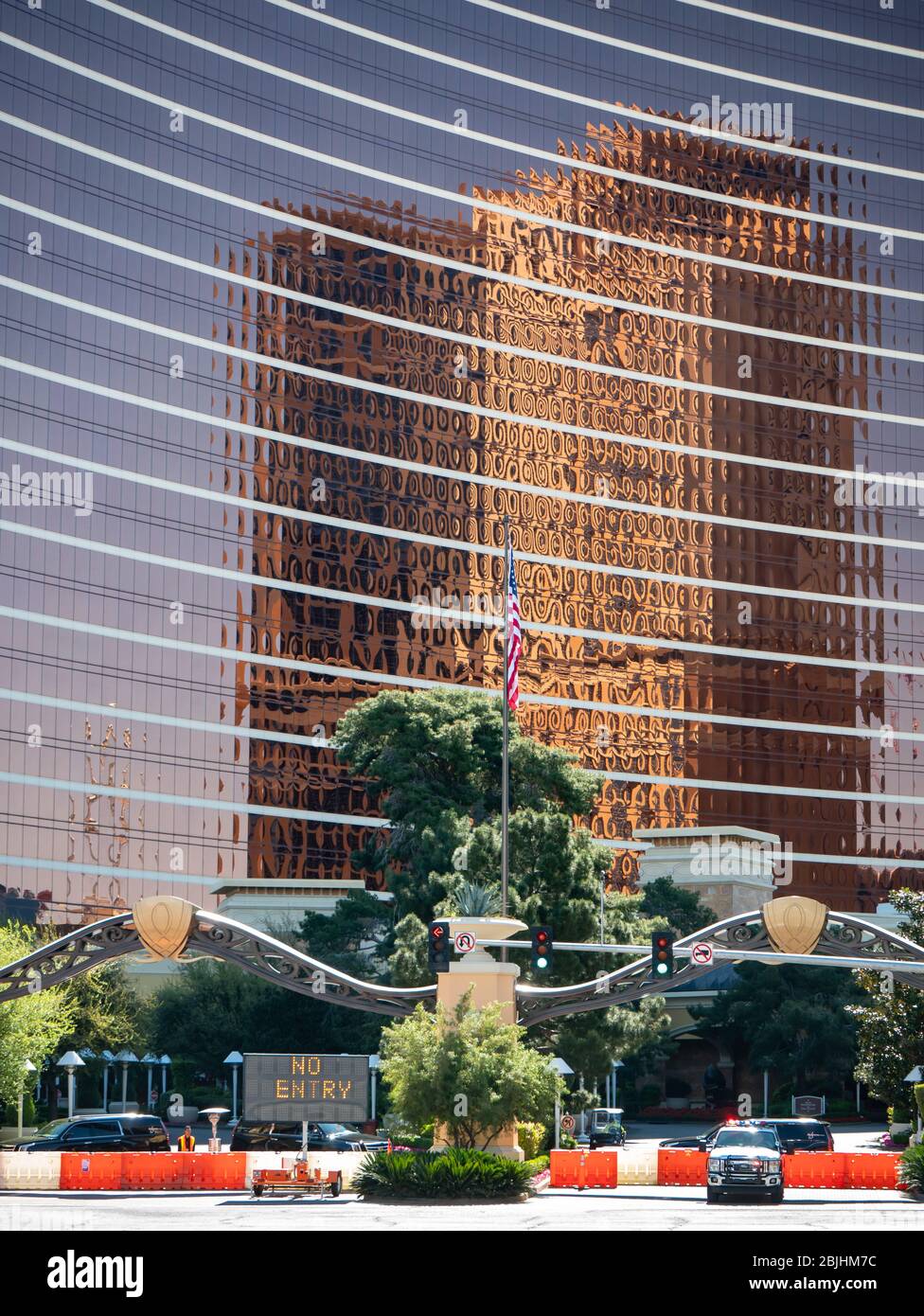 11 April 2020, Las Vegas, Nevada, USA, Reflection of Trump Tower on the Wynn with a no entry sign and security during Covid-19 shut down Stock Photo