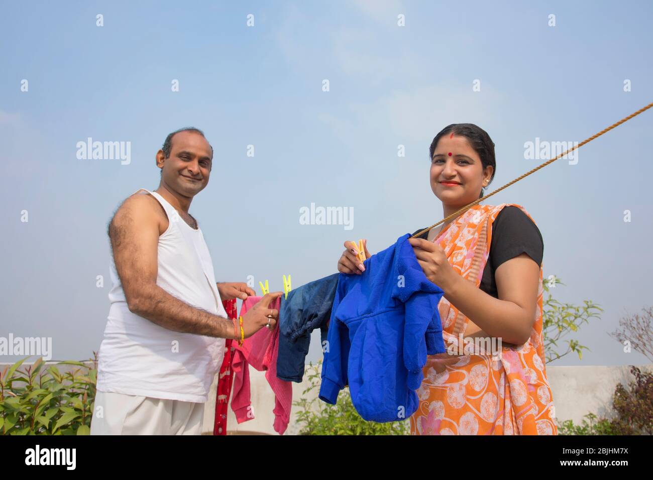 Pioneer Woman Hanging Clothes Outside Stock Photo 1768999874