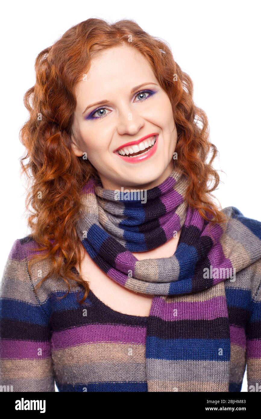 Portrait on isolated background of a young woman in winter clothes Stock Photo