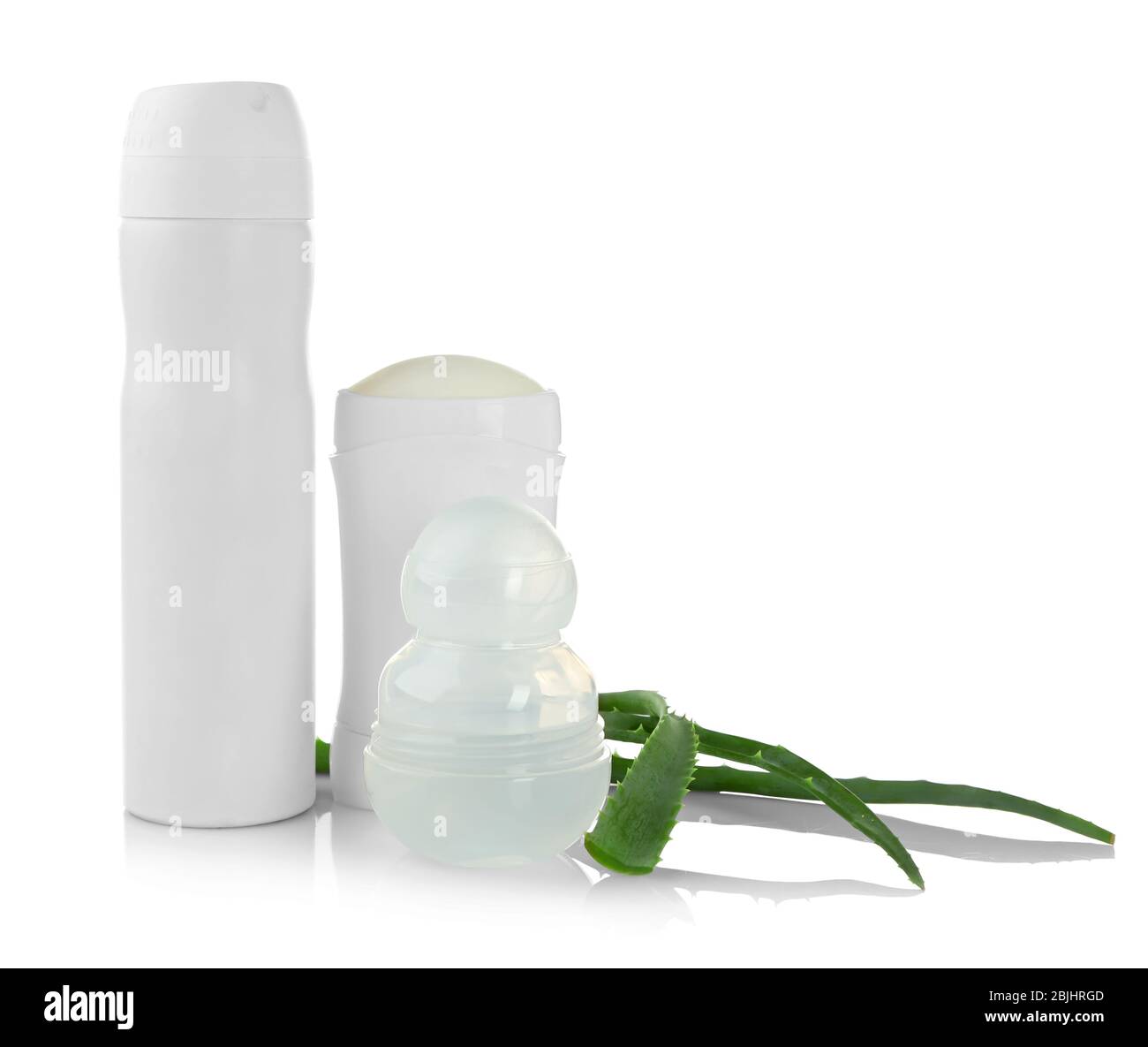 Different deodorants and aloe leaves isolated on white Stock Photo