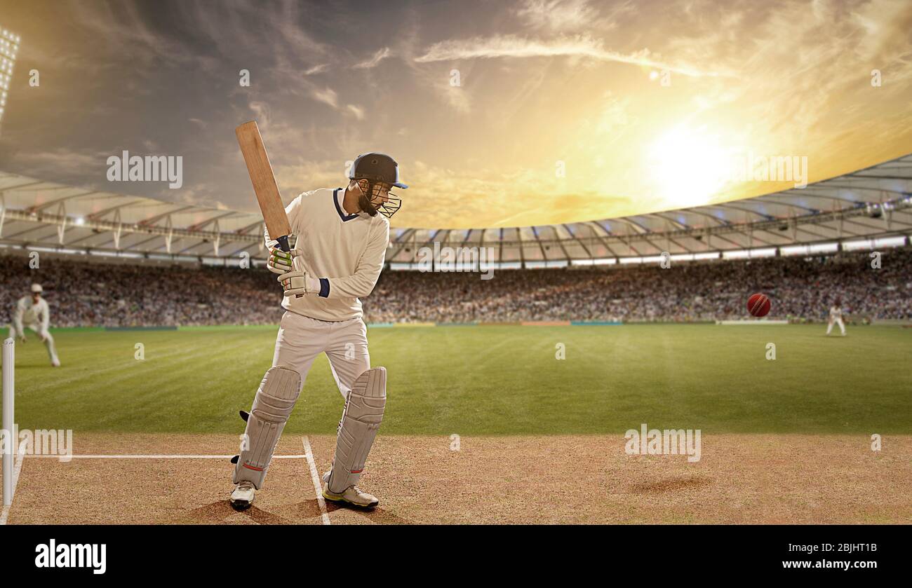 Indian man holding cricket bat hi-res stock photography and images - Alamy