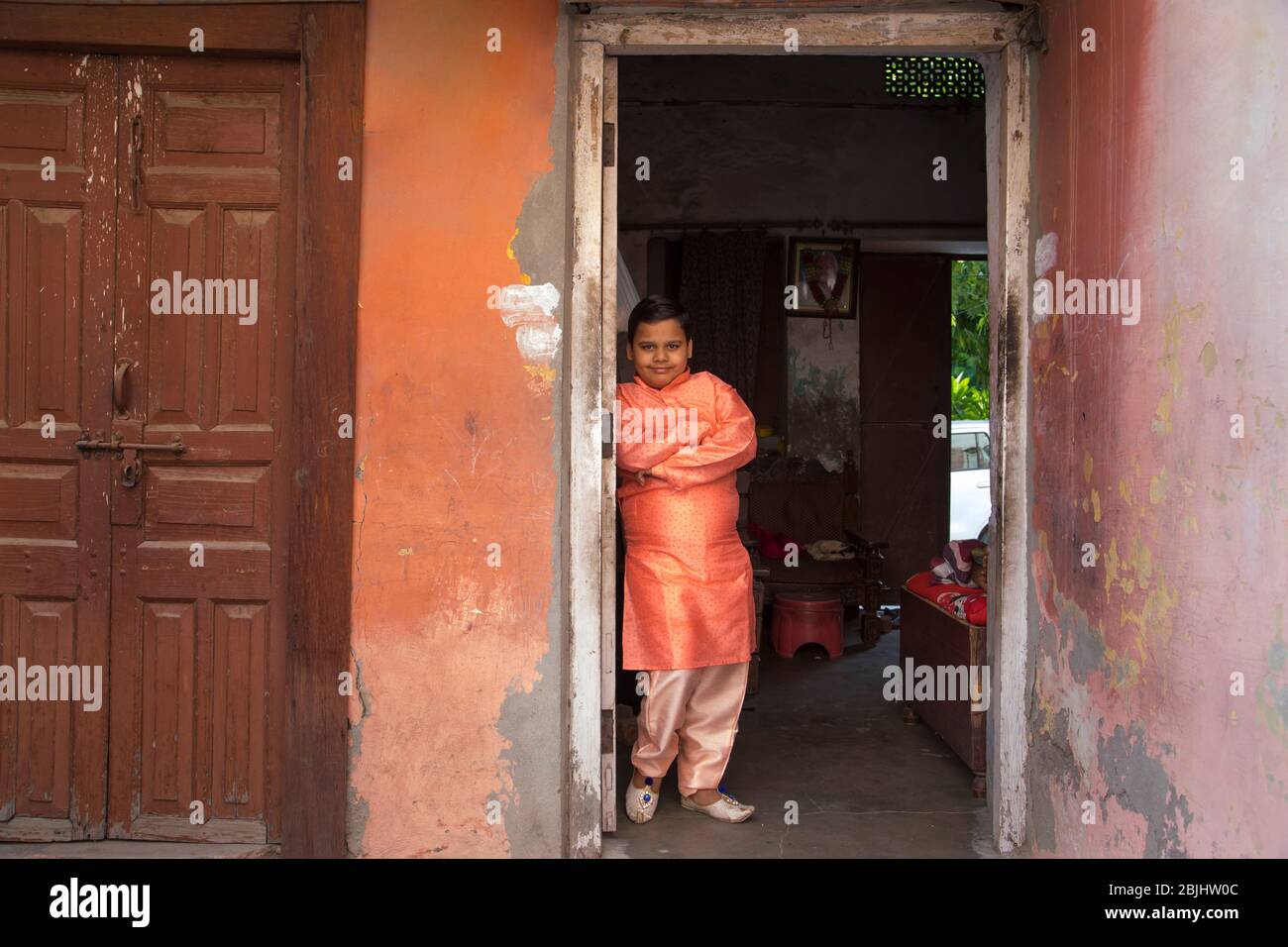 young boy standing in kurta pajama Stock Photo
