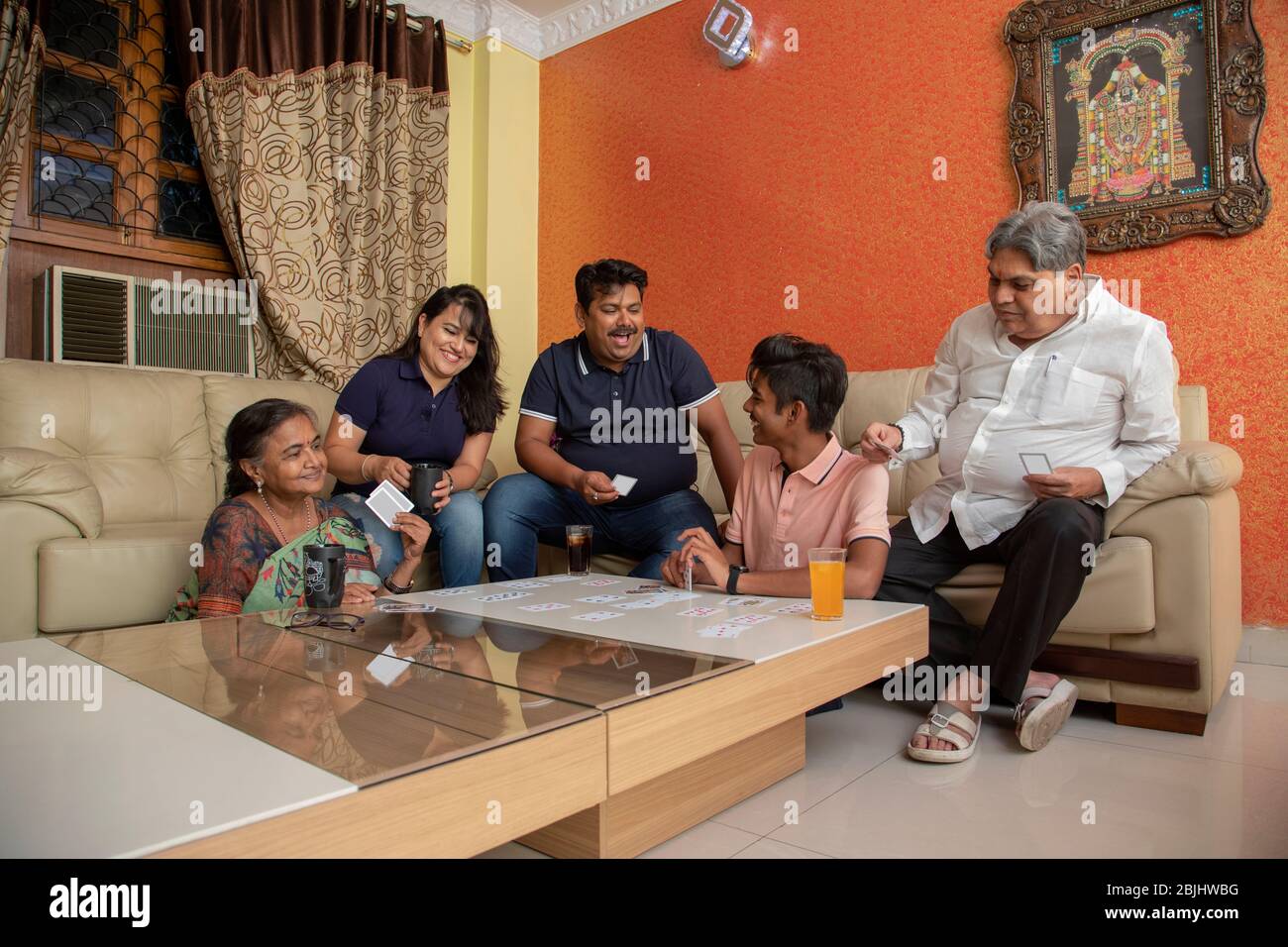 Family playing cards hi-res stock photography and images - Alamy