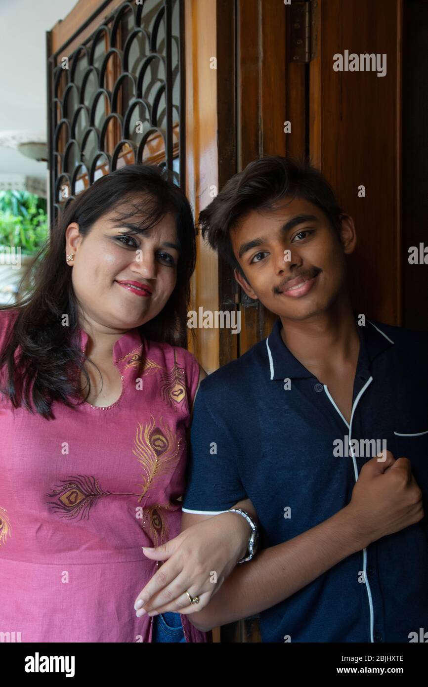 Indian mother and son standing hi-res stock photography and images - Alamy