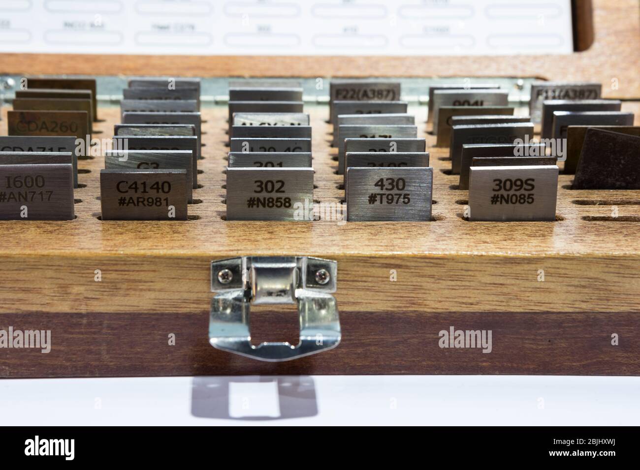 reference alloy standard metal specimen set box for chemical composition instrument calibration Stock Photo