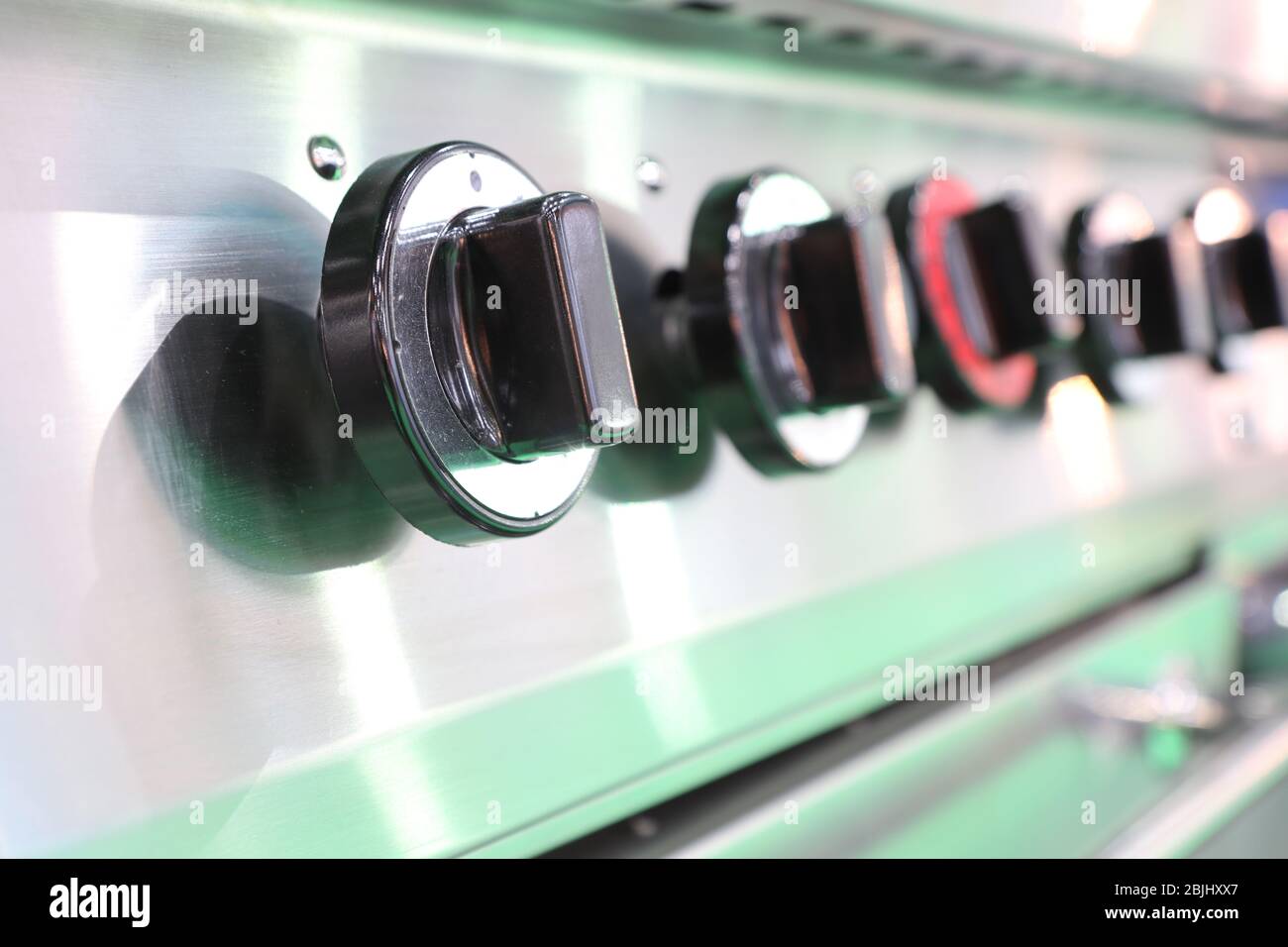 Close up black switch of Kitchen burning gas cooker ; knob Stock Photo ...