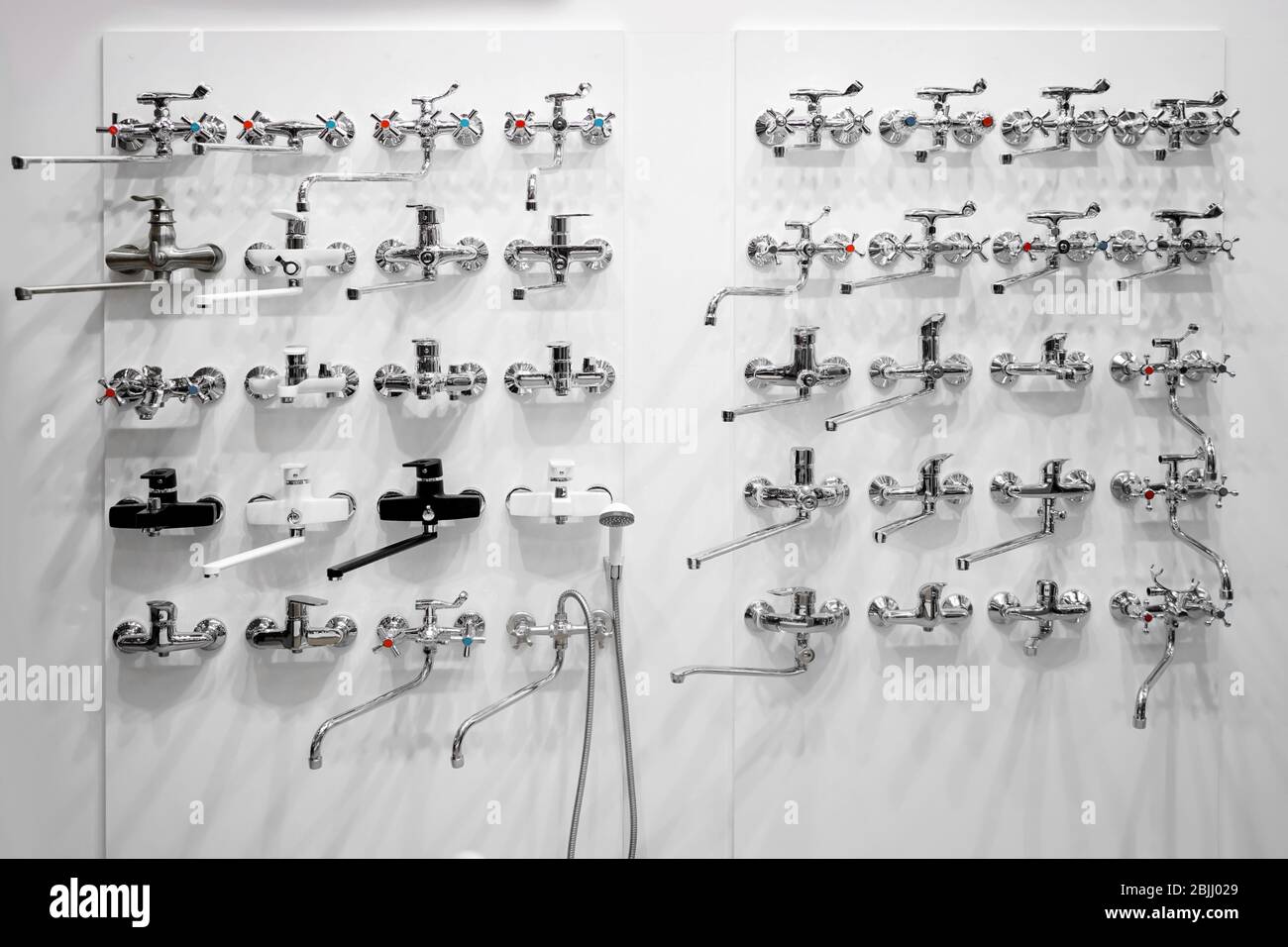 Varieties of water taps presented in store Stock Photo - Alamy