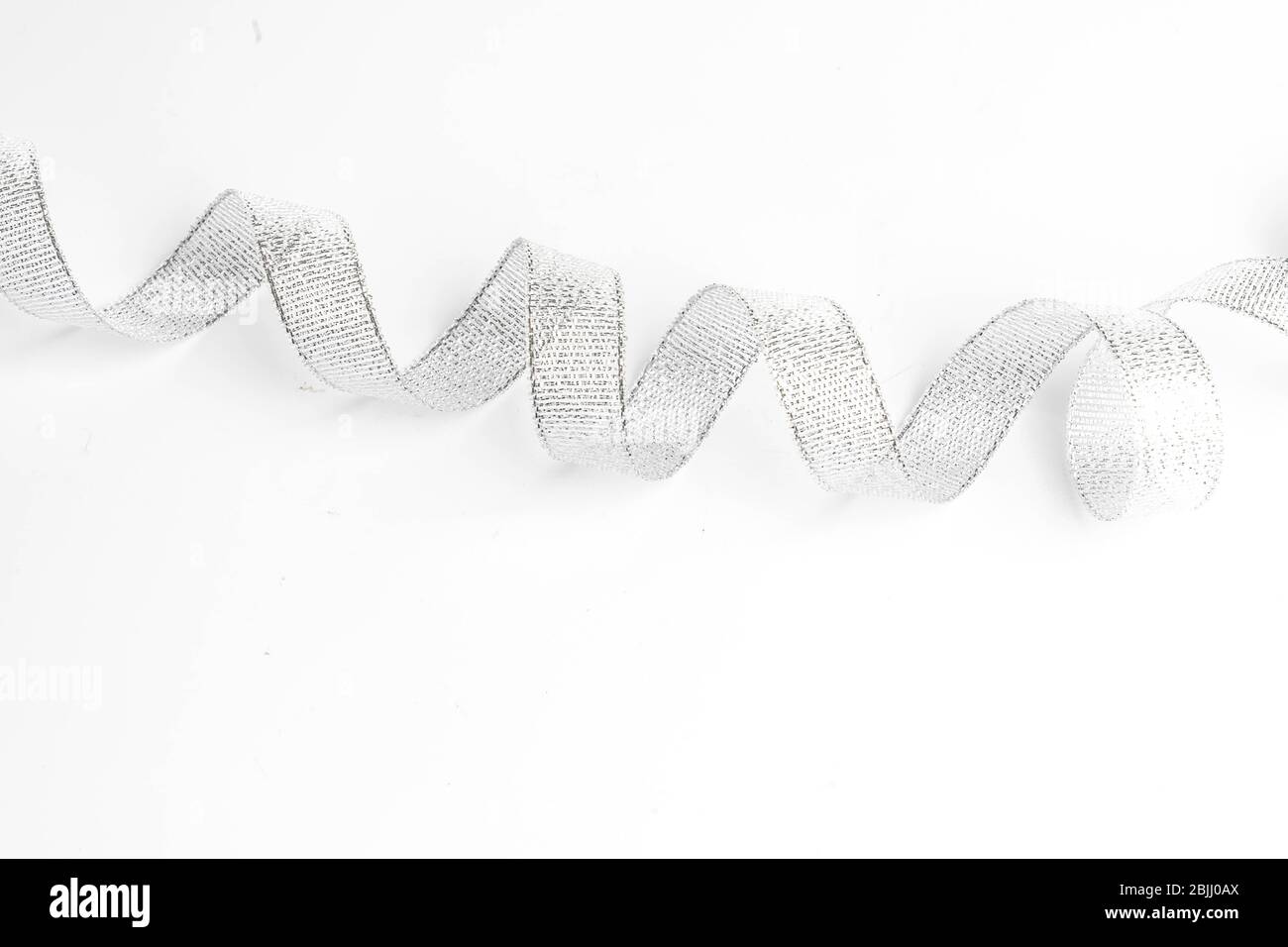 silver ribbon bow on white isolated background Stock Photo - Alamy