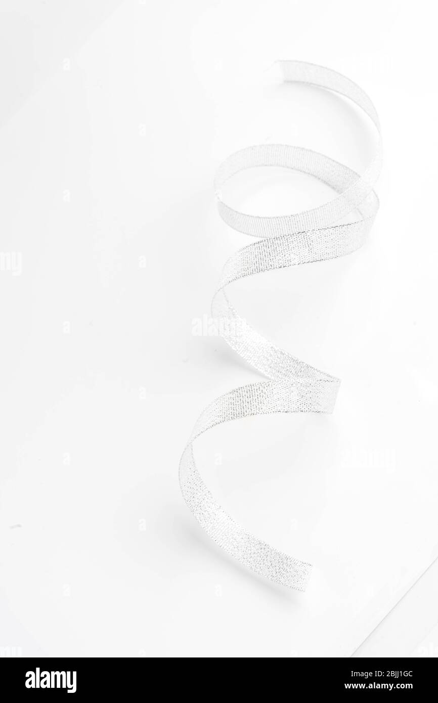 silver ribbon bow on white isolated background Stock Photo - Alamy