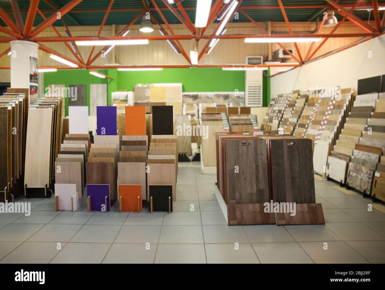Assortment of laminated flooring samples in hardware store Stock Photo