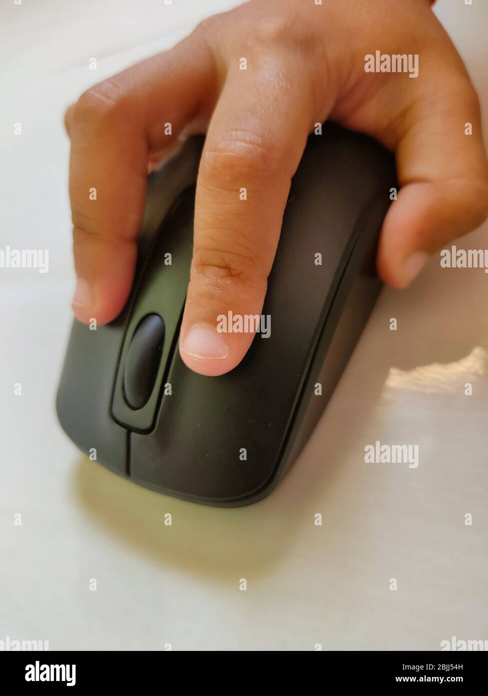 Computer mouse with Hand black keybord of notebook Stock Photo - Alamy