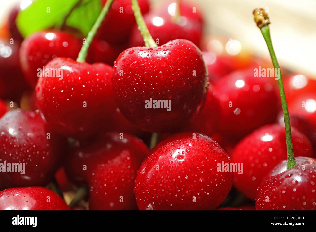Fresh ripe cherries, close up Stock Photo - Alamy