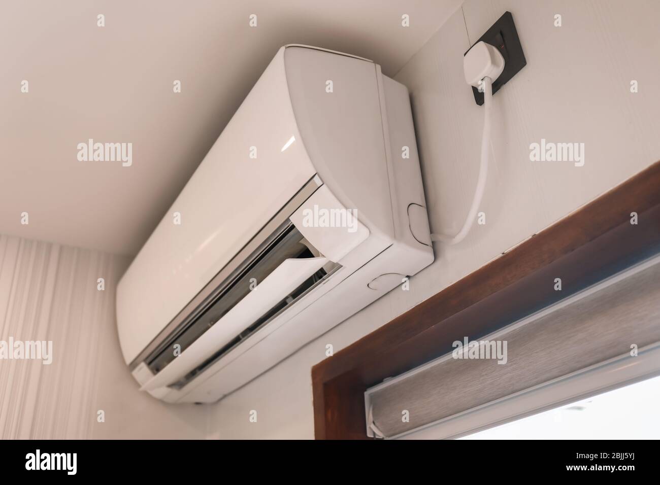 Air conditioner in modern flat Stock Photo - Alamy