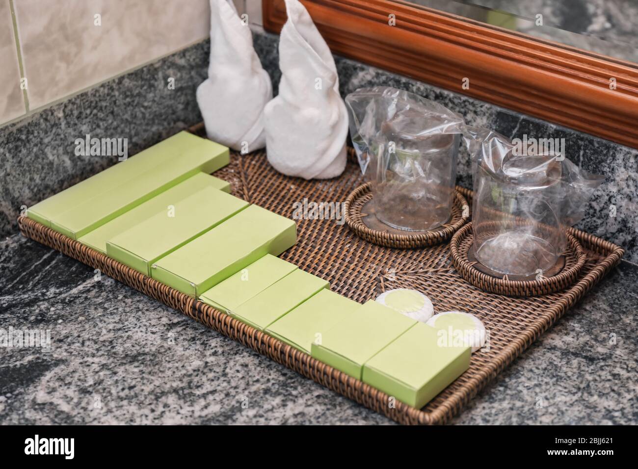 Set of cosmetic products in hotel bathroom Stock Photo - Alamy