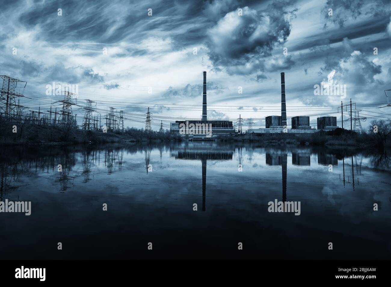Industrial thermal power plant with smokestack Stock Photo