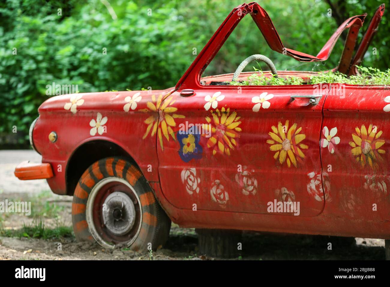 Flowerbed With Plants Made From Old Car Outdoors Stock Photo Alamy
