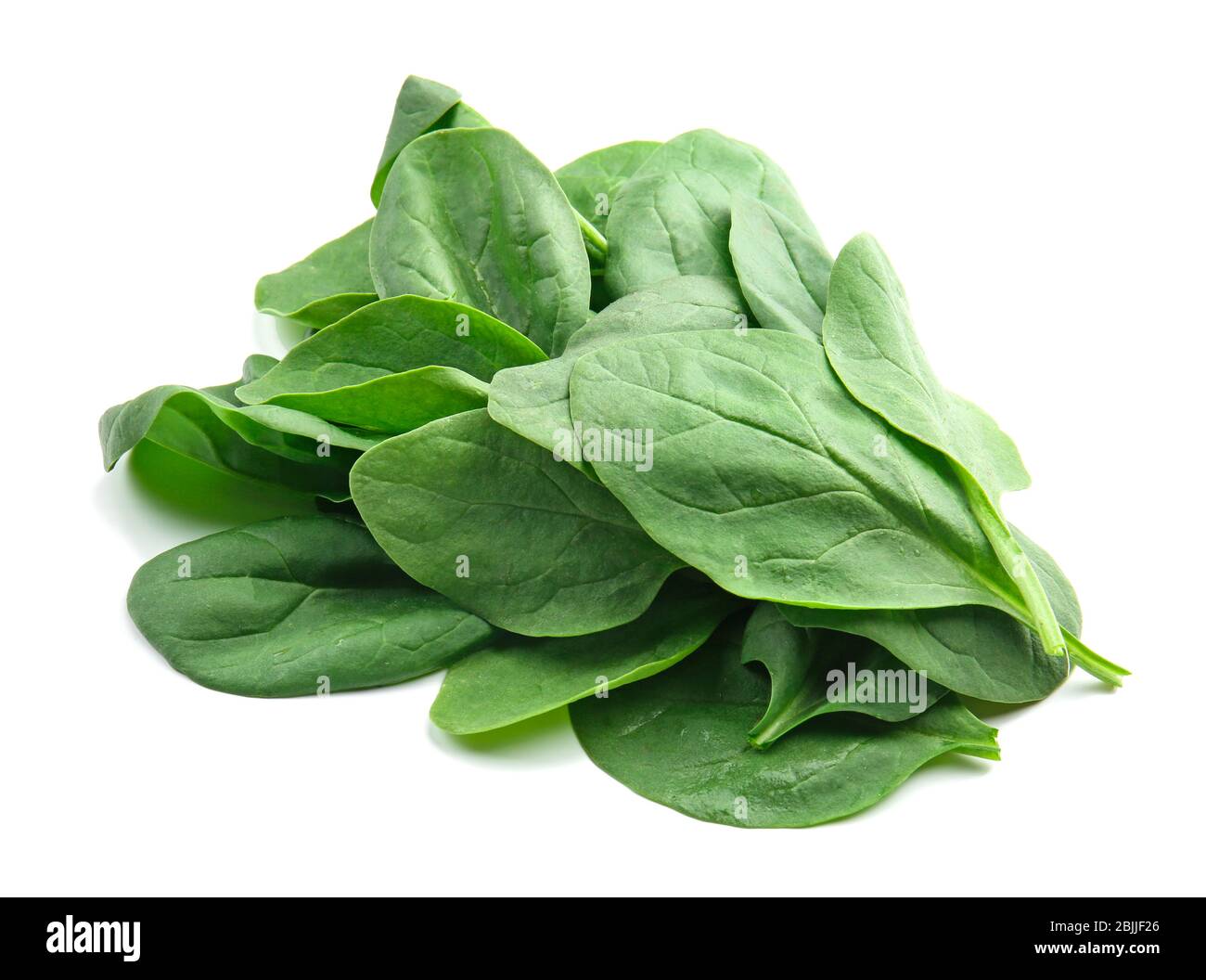 Fresh spinach leaves on white background Stock Photo - Alamy