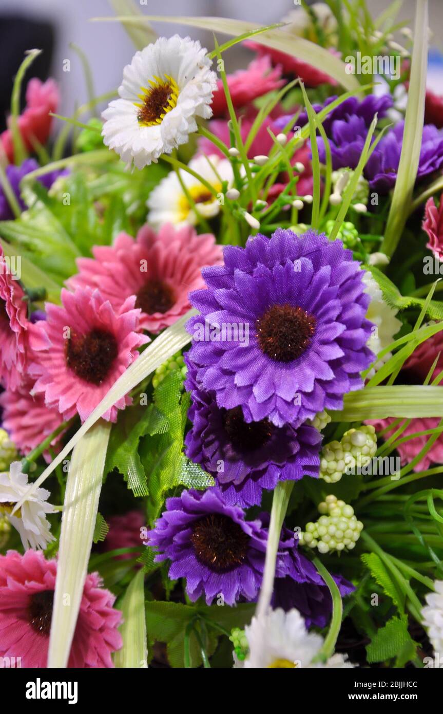 Bright and beautiful colors of plastic flowers Stock Photo Alamy