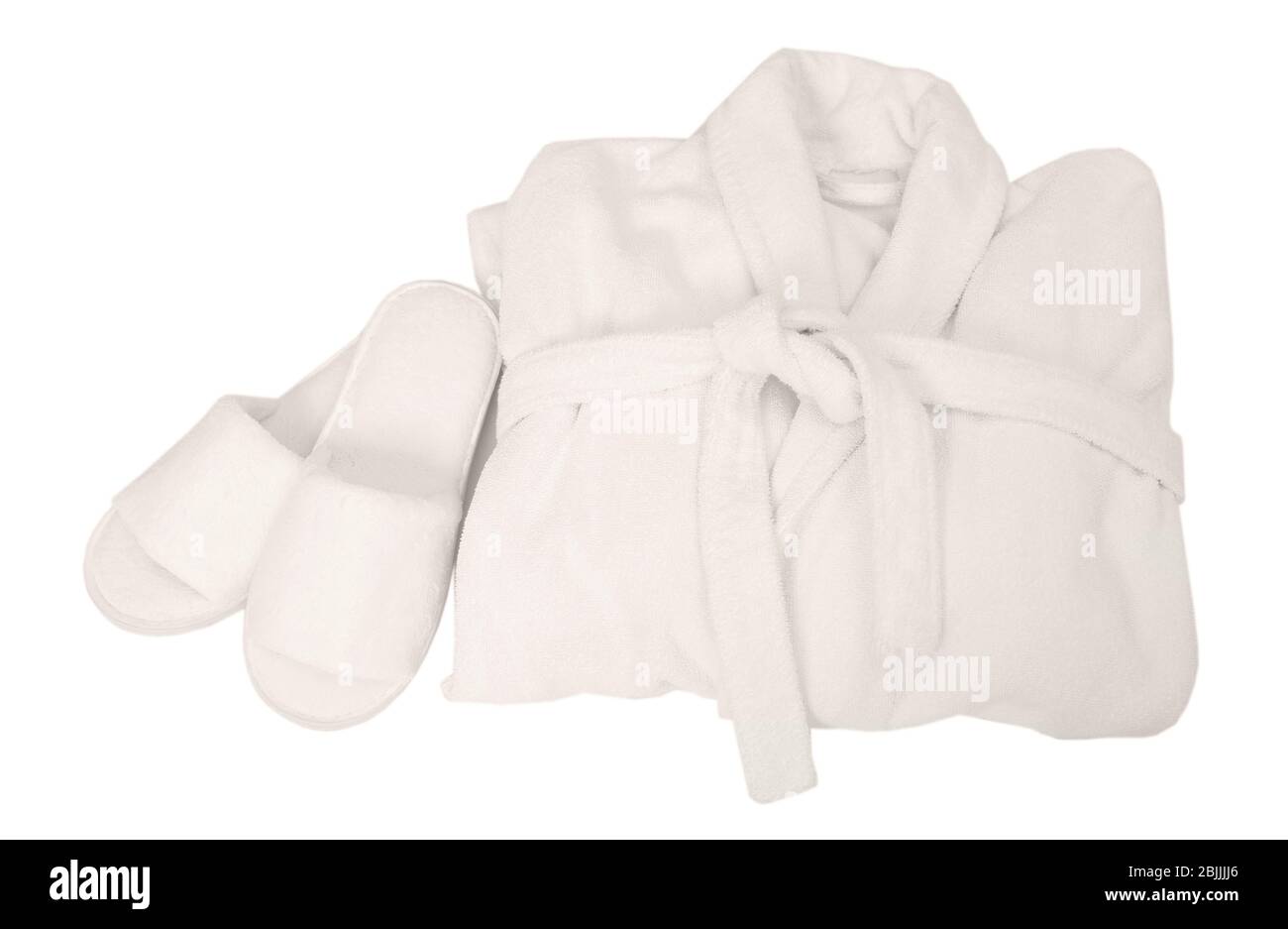Folded bathrobe and bathing slippers on white background Stock Photo ...
