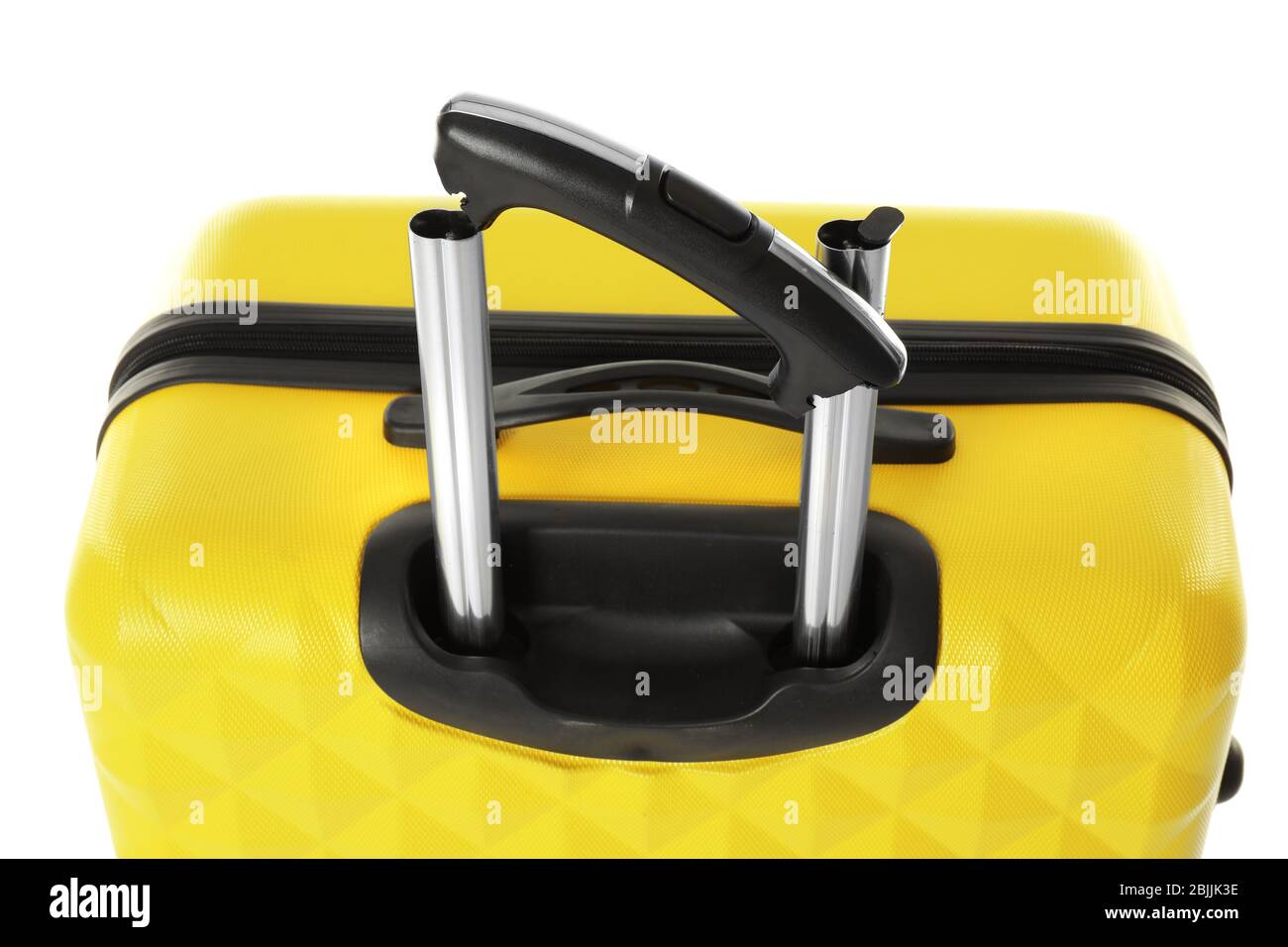 Yellow plastic luggage with broken handle on white background Stock