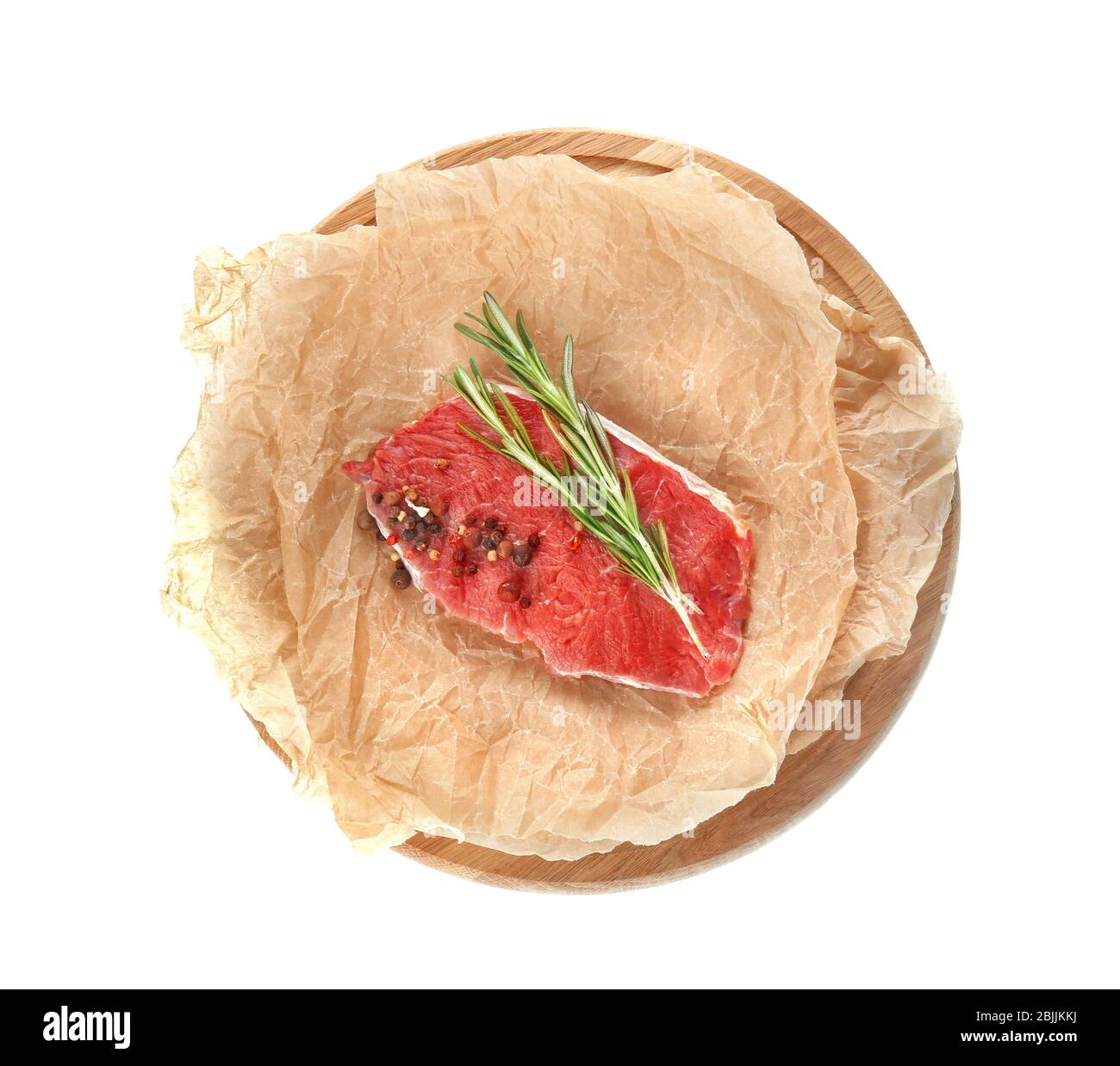 Wooden board with fresh raw meat on white background Stock Photo - Alamy