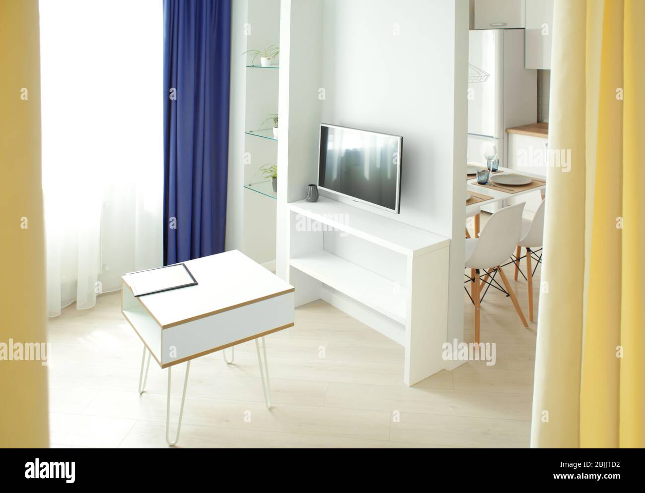 Picture of Interior of modern apartment with light living room Stock Photo - Alamy