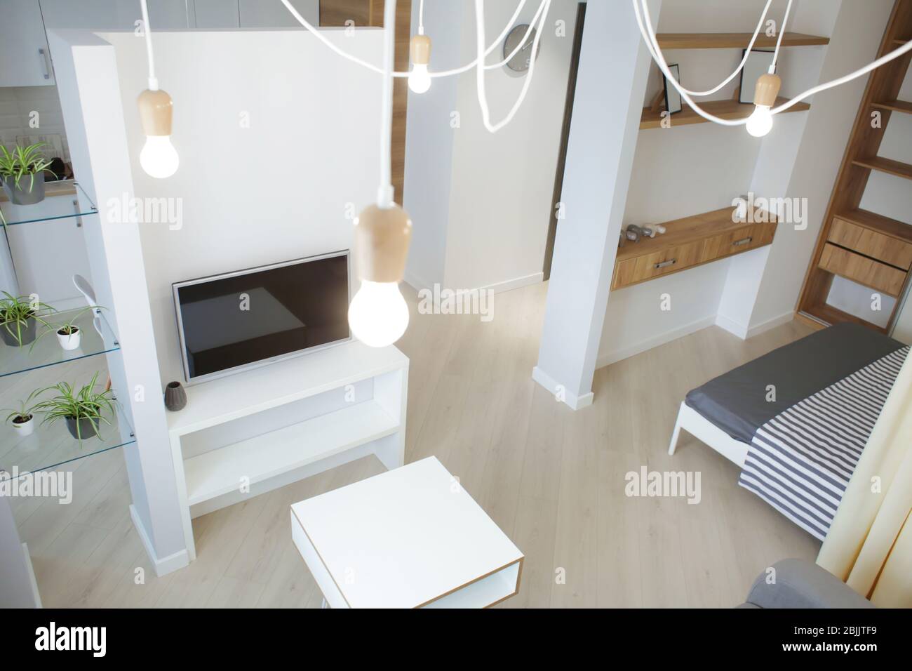 Interior of modern apartment with light living room Stock Photo - Alamy