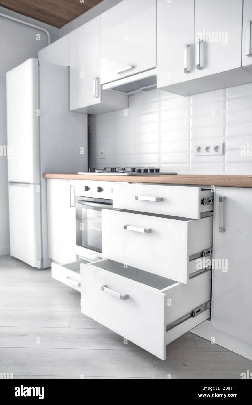Interior of light modern kitchen Stock Photo - Alamy