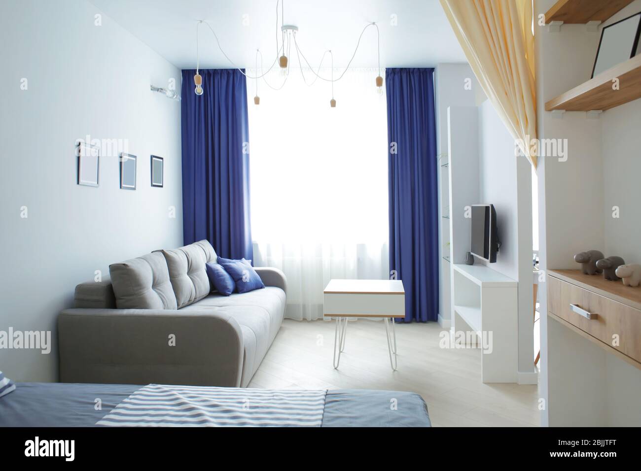 Picture of Interior of modern apartment with light living room Stock Photo - Alamy