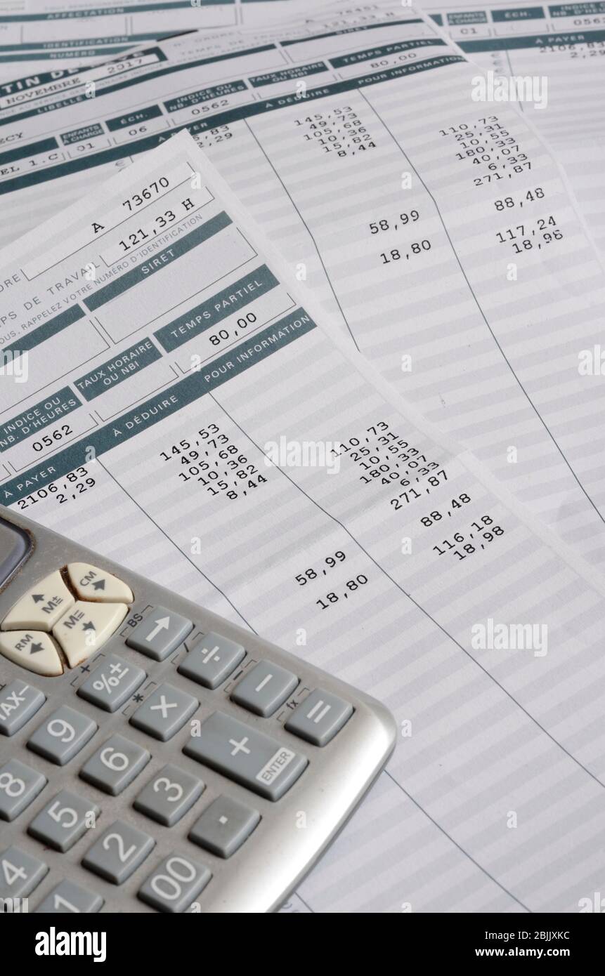 Euro Pay slip and calculator, close up for payroll or salary background, french mention Net to