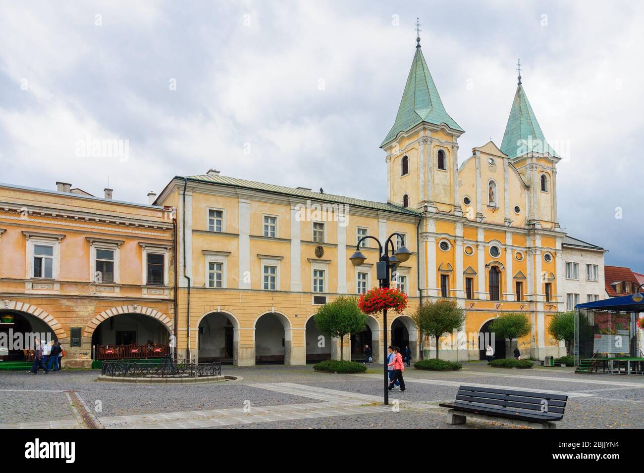 Zilina, Slovakia - September 23, 2013: View of the Conversion of St Paul Church, with town square, locals and visitors, in Zilina, Slovakia Stock Photo